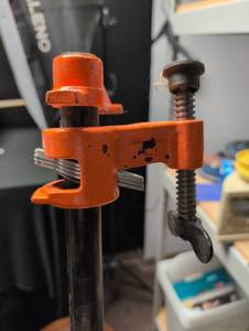 lot 1602 image: Adjustable Orange Pipe Clamp