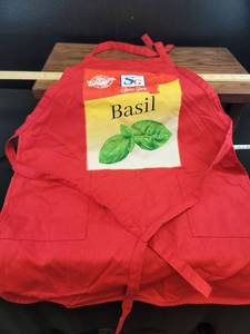lot 1915 image: Spice Girls Basil Red Kitchen Apron