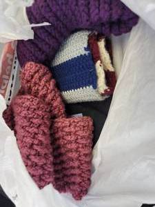 lot 1946 image: Handmade Knit Baby Hat Collection