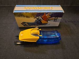 lot 1500 image: Avon Snowmobile Windjammer After Shave Bottle