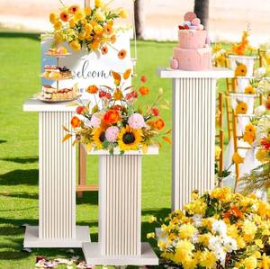 lot 34675 image: Mxtxmy 3PCS Square Pedestal Stand for Party,White Wood Display Pedestal Stands for Parties,Fluted Plinth Pillars Table Stands for Wedding Birthday Baby Shower Decor Display Plant Stand (White) - Retail $111