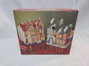 lot 400 image: Villa Noel 2-Piece Illuminated Porcelain Christmas Village Set
