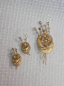 lot 408 image: Gold Tone Crystal Spray Brooch and earrings set