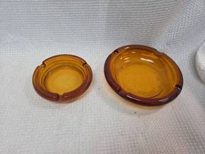 lot 447 image: Amber Glass Round Ashtrays - Set of 2