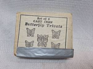 lot 472 image: Cast Iron Butterfly Trivets Set