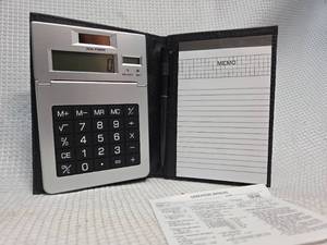 lot 535 image: Calculator with Memo Pad and Manual