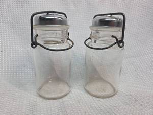 lot 679 image: Wide Side Glass Salt and Pepper Shakers with Wire Holders