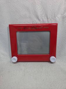 lot 687 image: Classic Red Etch A Sketch Drawing Toy