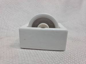 lot 704 image: Vintage porcelain stamp and envelope moistener.