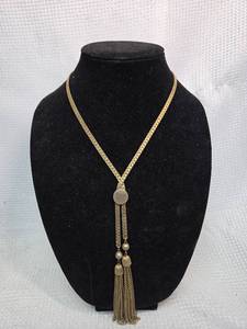 lot 713 image: Gold Tone Tassel  Necklace