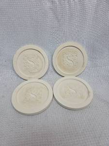 lot 717 image: Set of 4 S Coasters