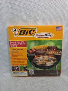 lot 751 image: BIC FlameDisk Portable Grilling Solution
