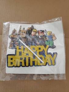 lot 71868 image: Video Game Cake Topper Decorations - Vibrant Glitter Cardboard Gamer Cake Topper, Eye-Catching Design, Firm Installation & Easy Adjusting, Sturdy Plastic Stick - Birthday Decorations for Boys & Girls - Retail $10