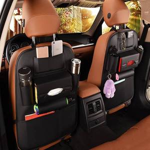lot 71878 image: 2 Pack PU Leather Premium Car SeatBack Organizer Travel Accessories Kick mats Back seat Protector and Cup Holder Holder Universal Use Seat Covers - Retail $26