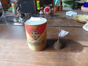 lot 1931 image: Skelly Can and Small Oiler