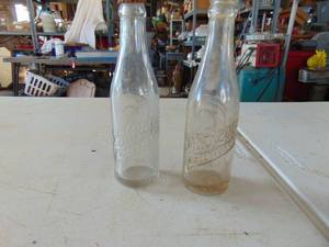 lot 2097 image: Pair of Embossed Dr. Pepper Bottles - Salina and Great Bend