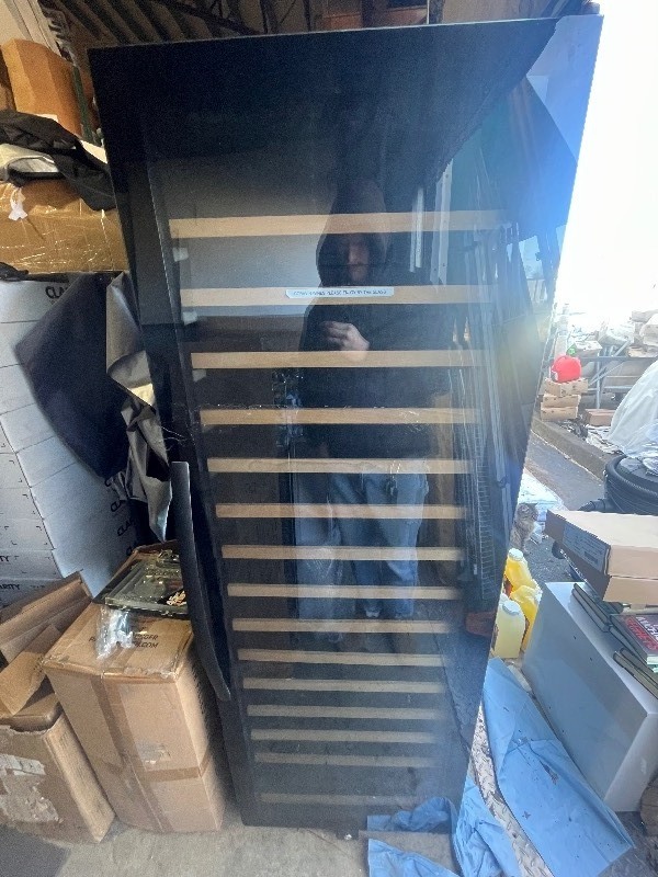 lot 12 image: WINE-ENTHUSIAST Beautiful Modern Design Black Standing Cooler (BU-428-X) 15 Shelves Came in Know nothing about it, Bid accordingly Retails $999