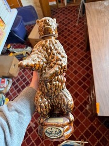 lot 27058 image: Vintage Ezra Brooks Standing Gold Bear Whiskey Decanter Figurine