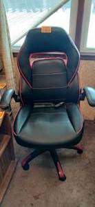 lot 26850 image: Black and Red Faux Leather Racing Style Gaming Chair with Flip-up Padded Armrests