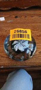 lot 26856 image: Vintage Glass Paperweight Encased with White Flower Design with a Dark Green Base