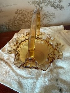 lot 27046 image: Vintage Fenton Colonial Amber Ruffled Handled Basket