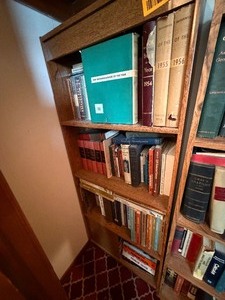 lot 27087 image: Wooden Bookshelf with a Variety of Books, Including many History, Mathematics, and Science Textbooks