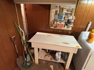 lot 27221 image: Wooden Work Bench, Also Includes Various Amounts of Household Cleaning Supplies and Soaps