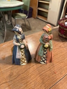 lot 27220 image: Vintage Cast Iron Woman Holding Bouquet Door-stopper
