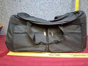 lot 408 image: Black Rolling Duffle Bag with Multiple Compartments. 34L x 12 W x 12 H.  Very good clean condition