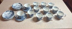 lot 100 image: Vintage BlueBrook pattern Ironstone cup and saucers by Staffordshire. Made in England Set of 12 - one cup has a small chip, others in excellent condition. Resell value $100-$150.  Come with the crate they are packed in on last photo