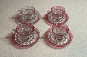 lot 106 image: Vintage Tiffin Franciscan Kings Crown Thumbprint Cranberry Flash Tea Cup and Saucers -  Set of 4 (one cupsaucer has some cranberry flash fade)