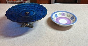 lot 108 image: Vintage Cobalt Blue Pressed Glass Cake Stand with Ornate Brass Pedestal base (has a gold string tied around the base) and a Floral Serving Bowl