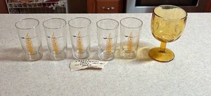 lot 109 image: Vintage Kansas Centennial Glass Set (celebrating 1861-1961) with Wheat Motif, and a Vintage 60s Bartlett Collins Amber Thumbprint Coin Dot Amber Goblet
