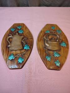 lot 157 image: Vintage Decorative Teapot Wall Plaques with Turquoise Leaves - wood look paint finish - material is either ceramic or plaster of paris