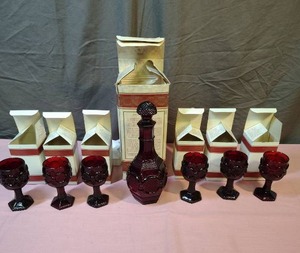 lot 174 image: Avon 1876 Cape Cod Wine Decanter and Goblet Set with Boxes bubble bath bottle is empty - bottle is about 8-9 high