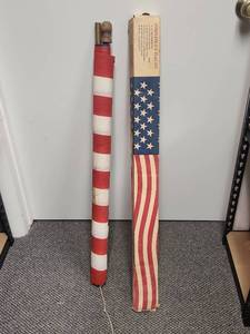lot 419 image: American Flag Pole Kit with Original Box - Fabric is an waterproof crepe type paper,  does have a tear in the corner - pole is wood