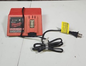 lot 469 image: Milwaukee NiCd Battery Charger 48-59-0255 - untested (no battery to test with, light comes on) - for older slide on style batteries