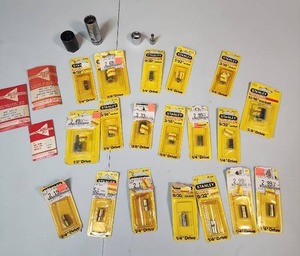 lot 506 image: Stanley Professional Sockets (new in package), a few package of drill bits, and a couple of loose sockets