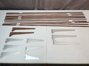 lot 525 image: Commercial Metal Shelf Standards and Brackets Set - the metal shelf standards and 2 of the brackets have Fruitwood finish that resembles wood, other brackets are chrome.  brackets various sizes