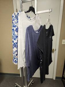 lot 82 image: Womens Size L & XL Casual tops - 3 are L (including 2 soft Cupio brand), the Hard Rock Cafe Orlando Bandana Print T-Shirt is XL but looks like it would fit a large better.