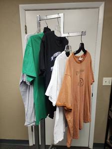 lot 84 image: Lot of 5 XL T-Shirts, including Salt Life, Eddie Bauer (XL Tall), and Utility Old School Tricycle Graphic T-Shirt (this one says XXL but looks more like an XL has some wash wearpiling)