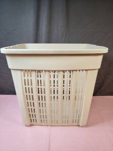 lot 197 image: Beige laundry basket - does have a crack near one handle but overall functional