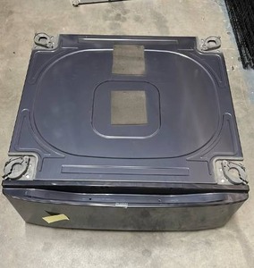 lot 6 image: WasherDryer Pedestal w Drawer - Dark Gray - no brand marking- has surface scratches on the drawer - appears unused and has 2 dividers and mounting instructions inside of drawer. 27 distance between center of feet for appliance. 30W x 30D x 12 H