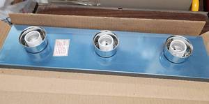 lot 457 image: Home Trends 18 Long 3-Light Chrome Vanity Strip Model 50621 (has blue protective film over the chrome bar) - new in open box