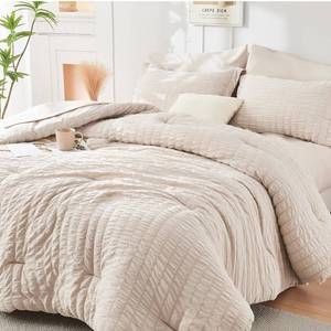 lot 1270 image: HYMOKEGE Beige Queen Comforter Set Seersucker 7 Pieces, All Season Luxury Bed in a Bag for Bedroom, Bedding Set with Comforters, Sheets, Pillowcases & Shams - Retail $42