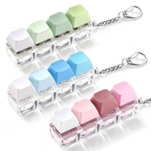 lot 8716 image: 3 Pack Keyboard Fidget Toy Clicky, Creamy &amp Silent Stress Relief Fidget Clicker Keychain Quiet Fidget Toys for Adults, Boost Focus &amp Calm Anxiety at Work, Travel Ideal Stress-Relief Gift