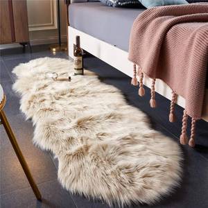 lot 8830 image: EasyJoy Ultra Soft FluffyFuzzy Shaggy Area Rug Faux Fur Chair Cover Seat Pad for Bedroom Floor Sofa Living Room (2 x 6 ft Sheepskin, Beige)