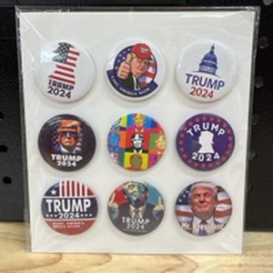 lot 4412 image: 9-Trump Pins - Retail $0