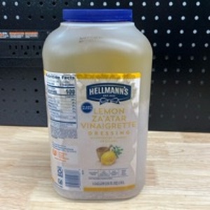 lot 4488 image: Hellmann��s Lemon za��Atar Vinaigrette Dressing. 1 Gallon Best By March 2026 - Retail $0
