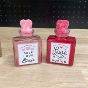 lot 4546 image: 48 Empty Glass Bottles with a Heart Shaped Cork - Retail $0